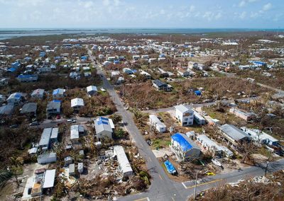 Aerial view of houses damaged by hurricane irma